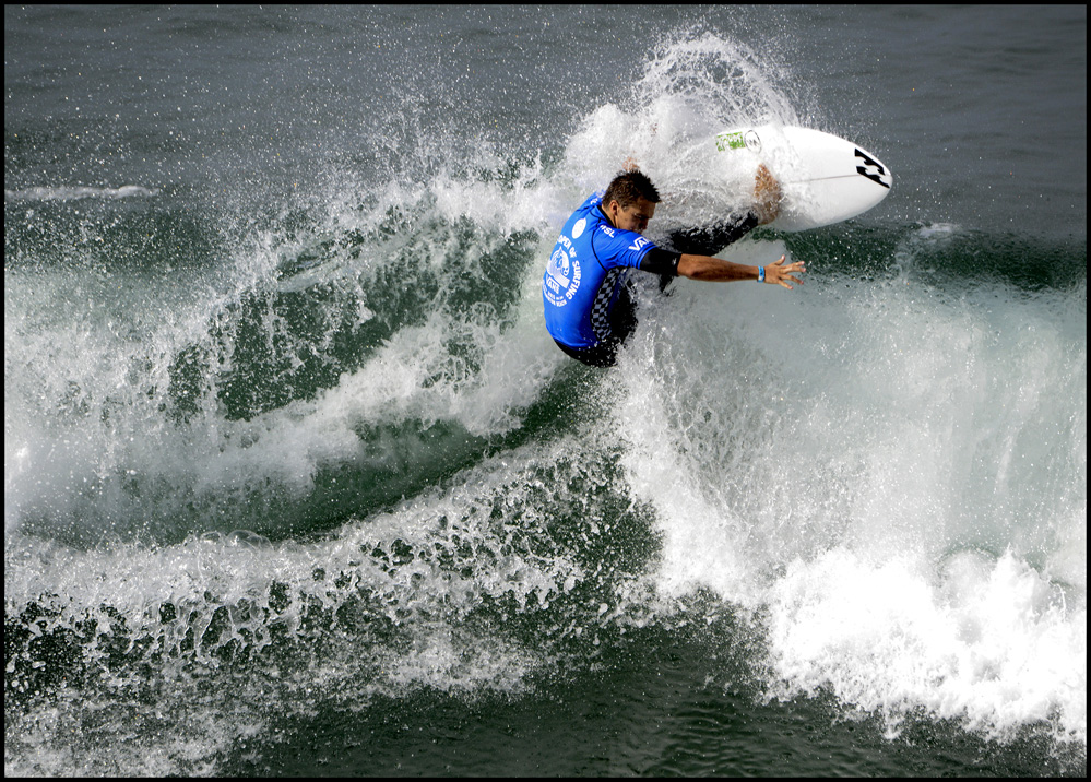 SPORT #4 MINH CHENG Title Surfing in Big Wave.jpg